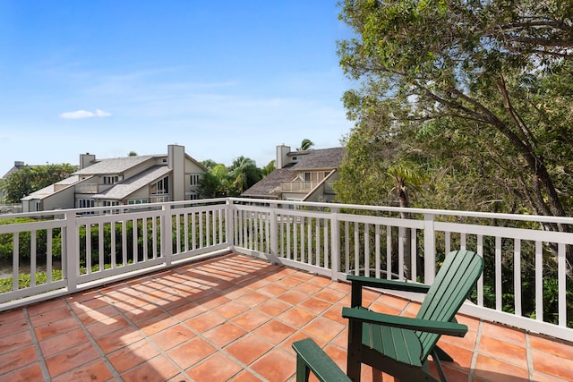 view of patio featuring a balcony