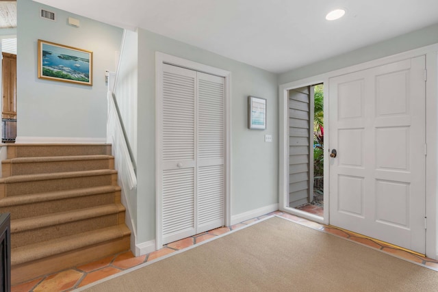 foyer with light tile patterned floors