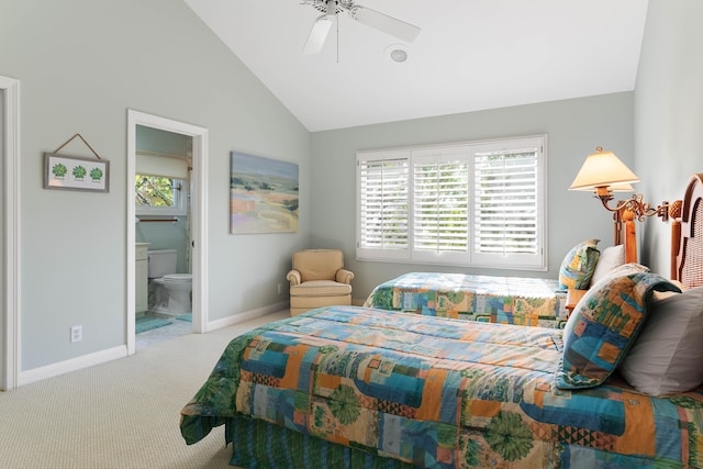 carpeted bedroom with connected bathroom, high vaulted ceiling, and ceiling fan