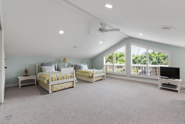 carpeted bedroom with ceiling fan and lofted ceiling with beams