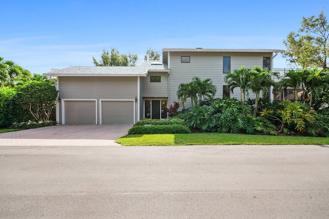 view of front of home with a garage