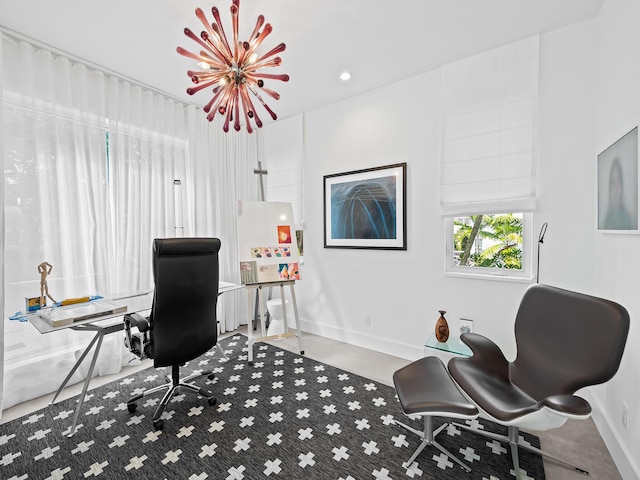 office area featuring a notable chandelier