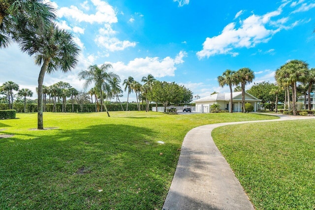 view of home's community with a lawn