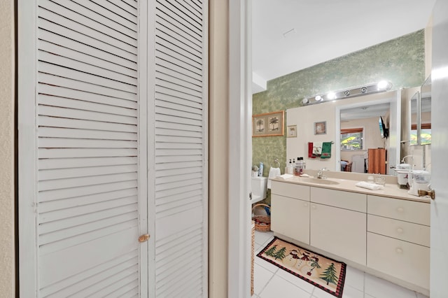 bathroom featuring tile patterned floors and vanity