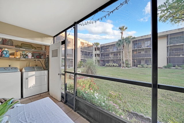 sunroom featuring separate washer and dryer