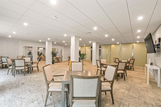 dining space with light carpet