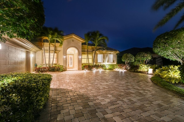 view of front of property featuring a garage