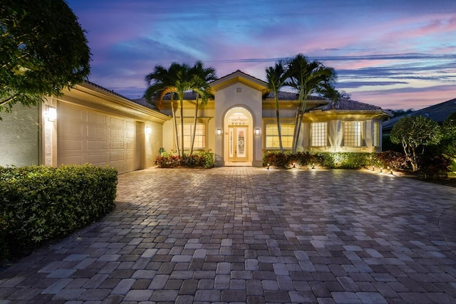 view of front of house with a garage