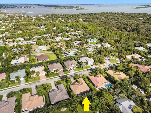 drone / aerial view featuring a water view