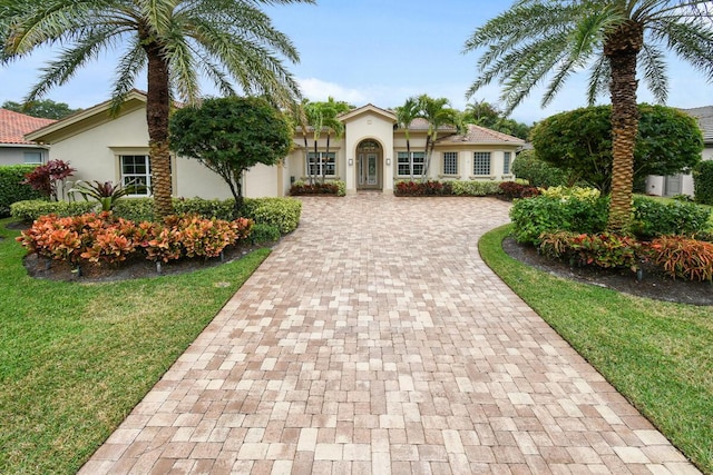 view of front of home with a front yard