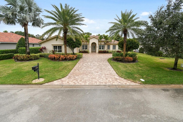 view of front of house with a front lawn