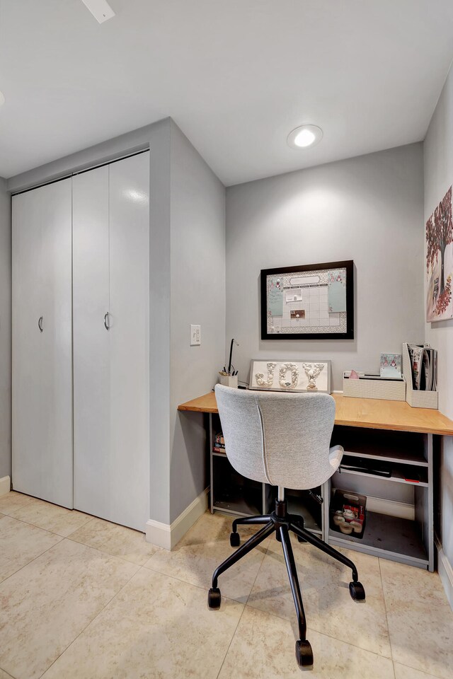 home office featuring light tile patterned floors