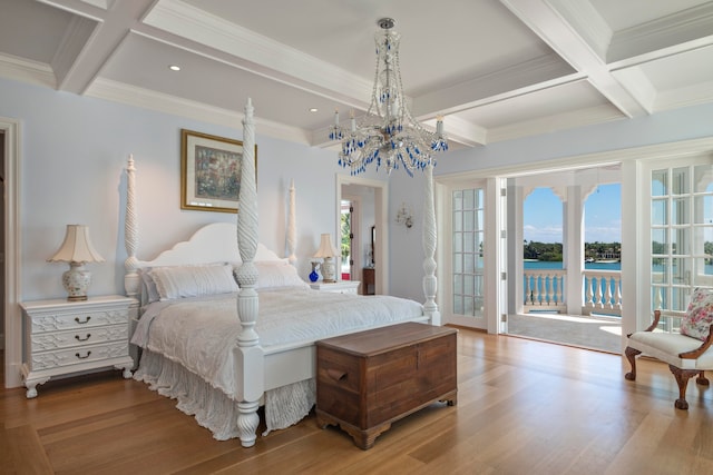 bedroom with access to outside, crown molding, beamed ceiling, and hardwood / wood-style flooring