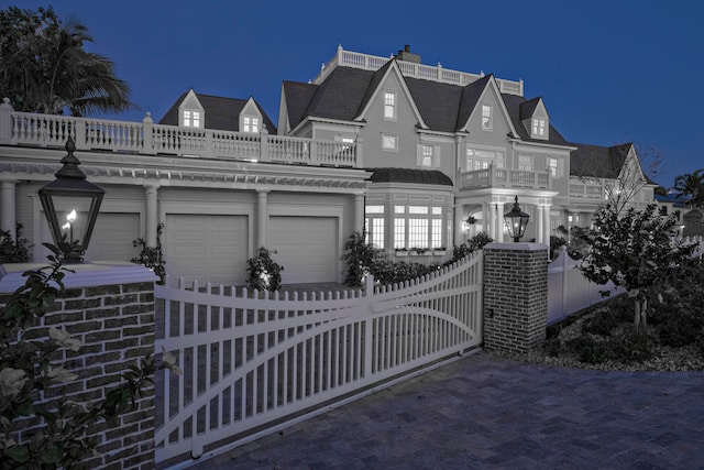 view of gate at night