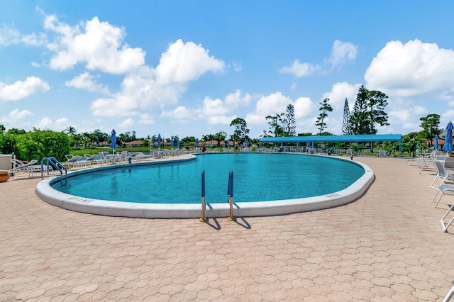 view of pool with a patio area