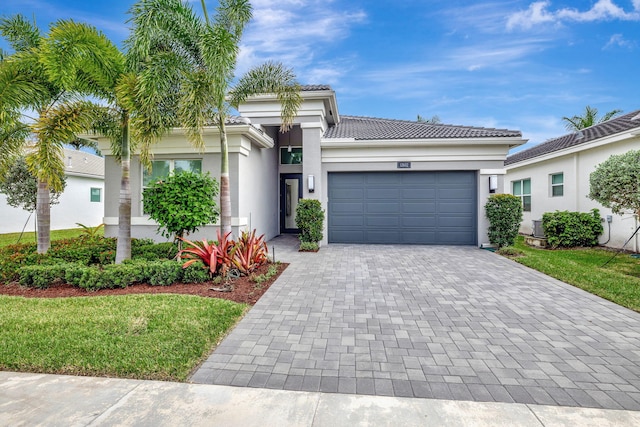 view of front of home with a garage