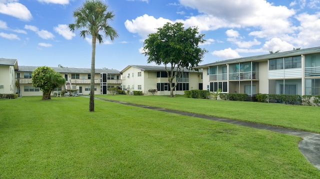 surrounding community with a lawn