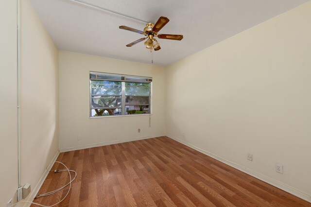 unfurnished room with light hardwood / wood-style floors and ceiling fan