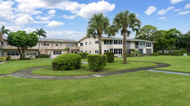 view of community with a yard