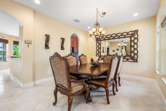 dining room with a chandelier