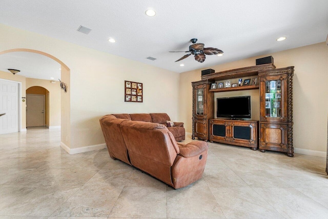 living room with ceiling fan