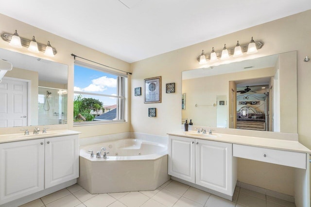 bathroom featuring separate shower and tub, tile patterned floors, and vanity