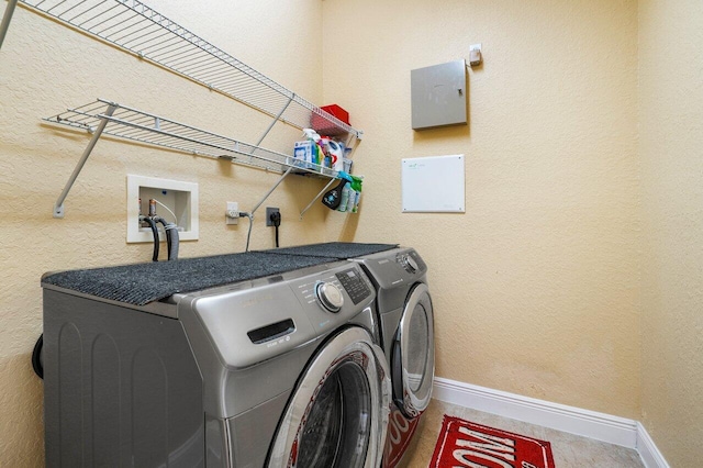 laundry room featuring washing machine and dryer