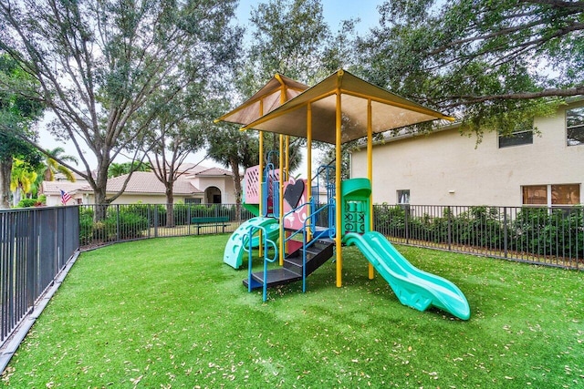 view of play area with a yard