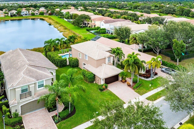 drone / aerial view with a water view