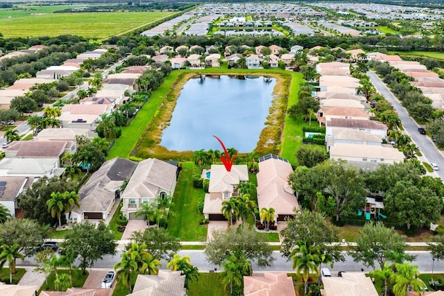 drone / aerial view featuring a water view