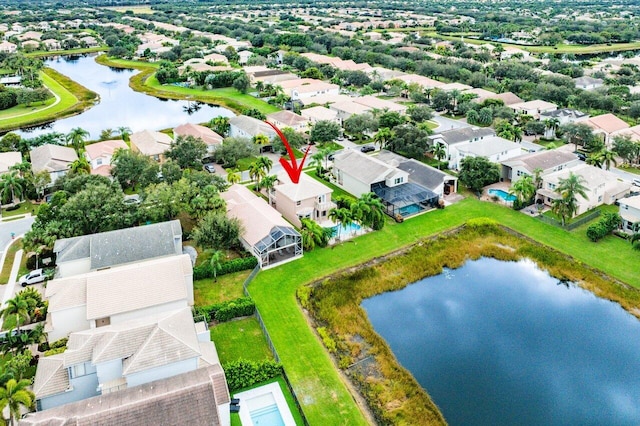 drone / aerial view with a water view