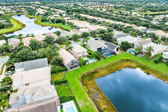 bird's eye view with a water view