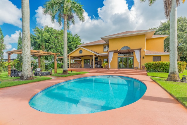 view of swimming pool featuring a patio area and ceiling fan