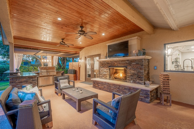 living room featuring wooden ceiling, ceiling fan, light colored carpet, and an outdoor stone fireplace