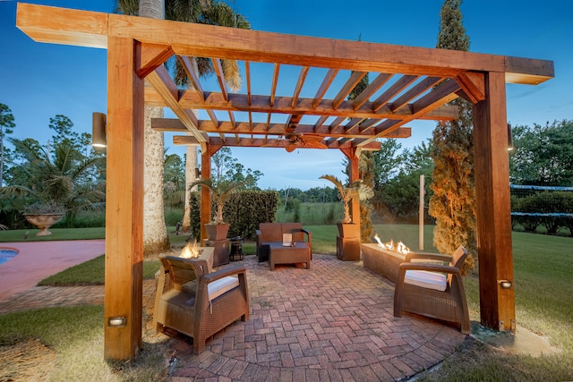 view of patio featuring a pergola and a fire pit