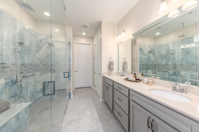 bathroom with vanity and walk in shower