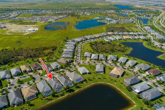 drone / aerial view featuring a water view