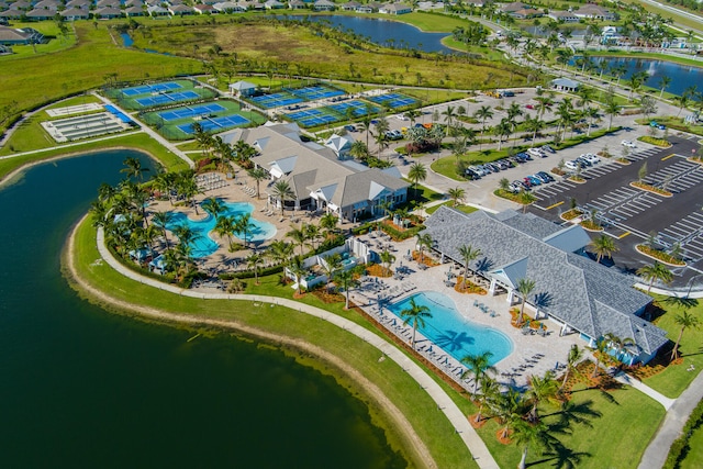 bird's eye view with a water view