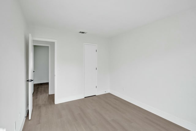 empty room featuring light hardwood / wood-style floors