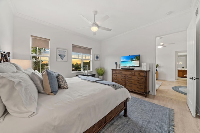 bedroom featuring light hardwood / wood-style flooring, ceiling fan, and ornamental molding