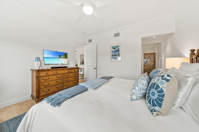 bedroom with ceiling fan, wood-type flooring, and ornamental molding