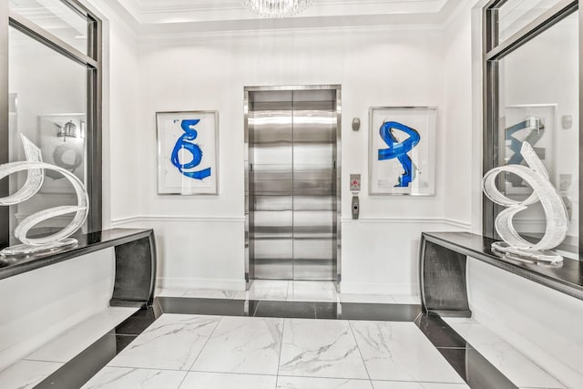 interior space with elevator and crown molding