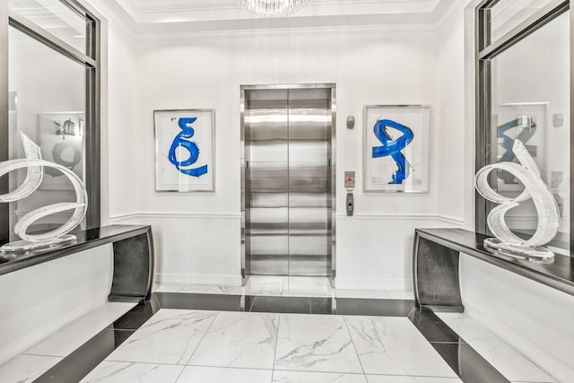 200 NE 2nd Ave Unit 314, Delray Beach, FL 33444 - miscellaneous room featuring elevator, ornamental molding, and marble finish floors