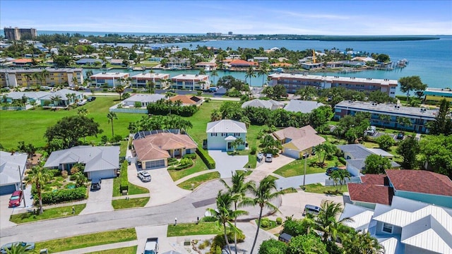 drone / aerial view with a water view