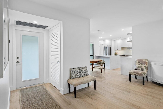 foyer featuring light hardwood / wood-style flooring