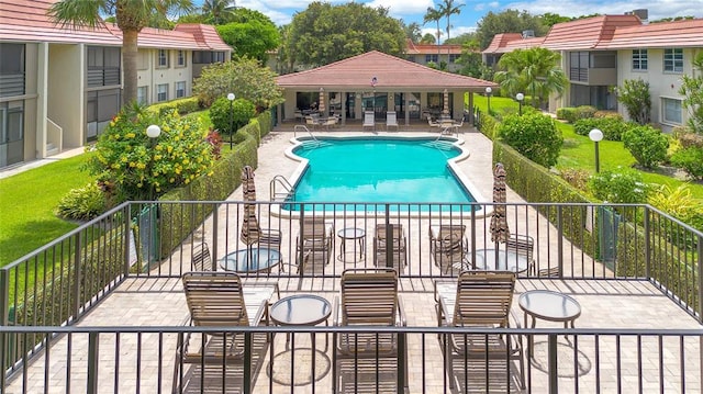 view of swimming pool featuring a gazebo and a patio area