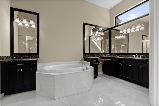 bathroom featuring vanity, tile patterned flooring, and plus walk in shower