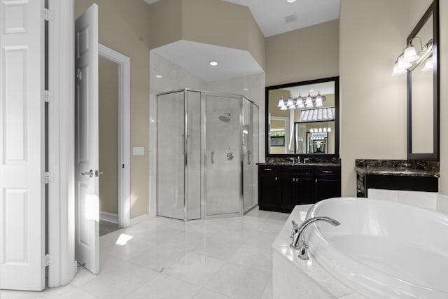 bathroom featuring vanity and plus walk in shower