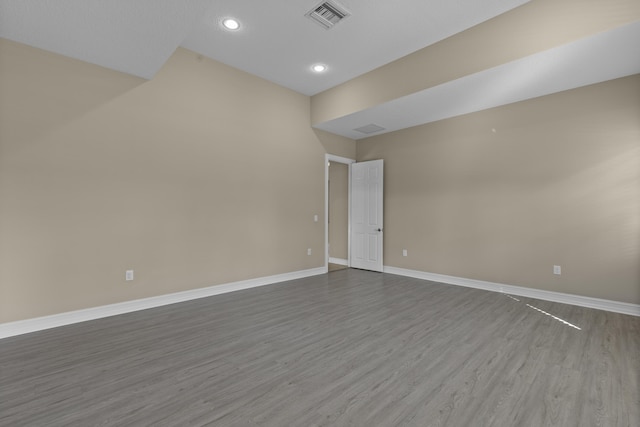 empty room featuring hardwood / wood-style floors