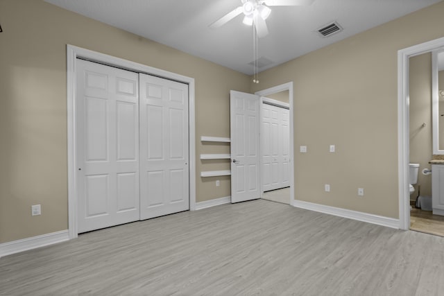 unfurnished bedroom featuring connected bathroom, a textured ceiling, ceiling fan, and light hardwood / wood-style floors